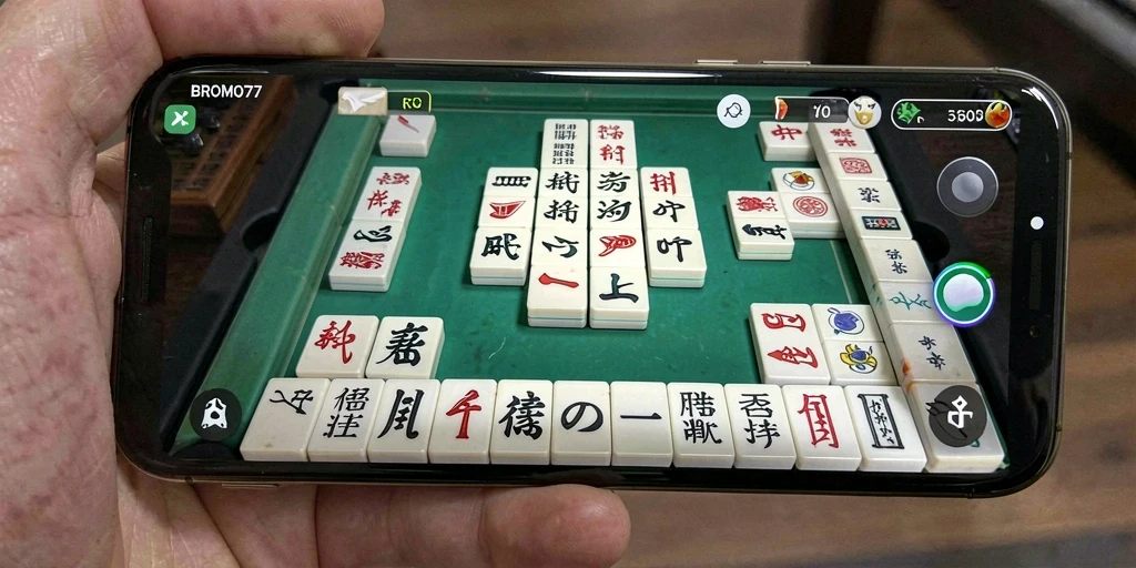 Screenshot gameplay BROMO77 dengan tampilan menarik dan ubin Mahjong.